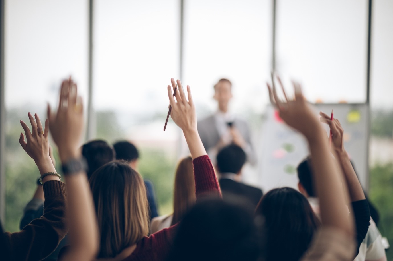 People with hands up